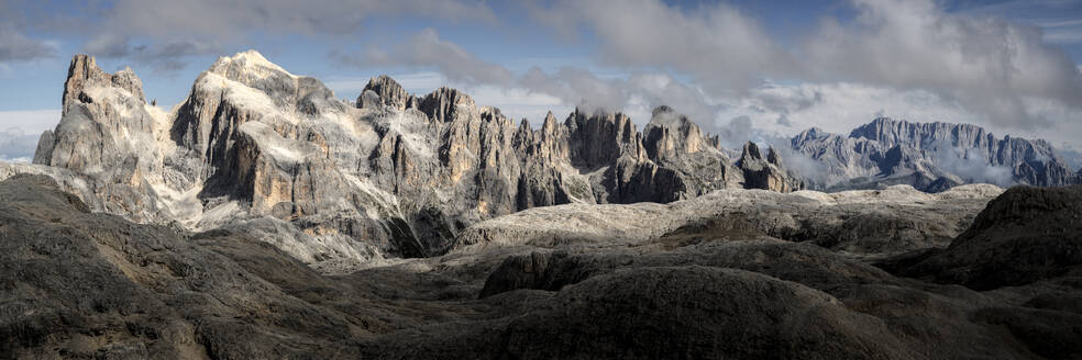 Rocky mountains under cloudy sky at Dolomites, Italy - ALRF02081
