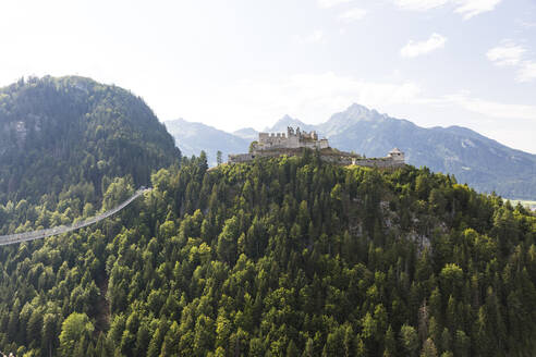 Austria, Tyrol, Reutte, View of Ehrenberg Castle and surrounding landscape in summer - AIF00772