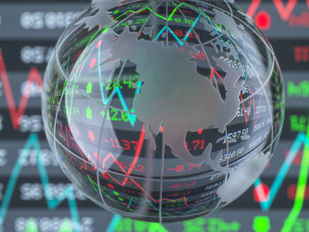 Reflection of financial numbers and graph on glass globe - ABRF01050