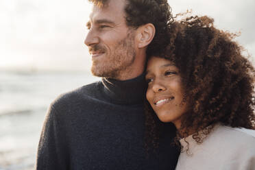 Loving couple spending time together at beach - JOSEF17258