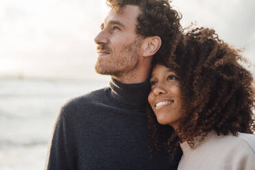 Happy loving couple spending time together at beach - JOSEF17260