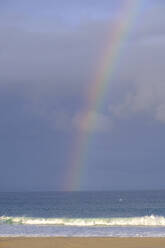 South Africa, Eastern Cape, Rainbow arching over Jeffreys Bay - LBF03763