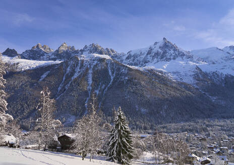 Scenic view of snowcapped mountains on sunny day - JAHF00333