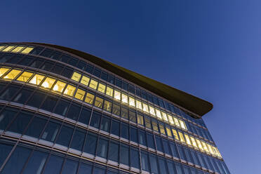Windows of office building at dusk - WDF07268