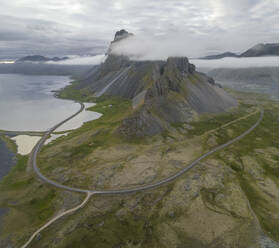Panoramic aerial view of Hvalnes Nature Reserve with mountains along the coastline, Eastern, Iceland. - AAEF17390