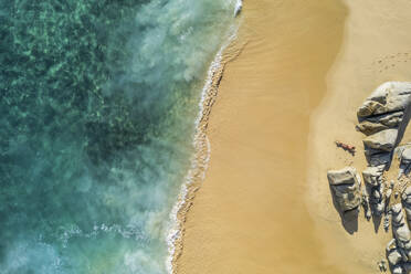 Aerial view of a person on the beach at Playa de los Amantes, Cabo San Lucas, Baja California, Mexico. - AAEF17408