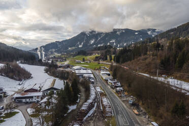 Aerial view of a winter mountain landscape with snow in Eben Im Pongau, Salzburg, Austria. - AAEF17437