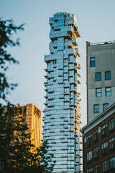 Low angle of Jenga Tower contemporary skyscraper building located at 56 Leonard in Lower Manhattan - ADSF43247