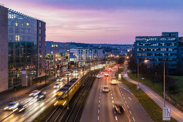 Germany, Baden-Wurttemberg, Stuttgart, Blurred motion of traffic on Bundesstrasse 27 at dusk - WDF07286