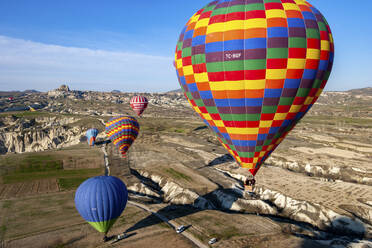 Aerial view of hot air balloons in Cappadocia, Turkey. - AAEF17581