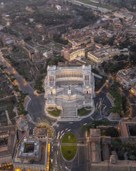 Aerial view of Altare della Patria in Venezia Square at night in Rome downtown, Lazio, Italy. - AAEF17619
