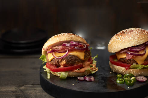 Studio shot of two ready-to-eat hamburgers - KSWF02357