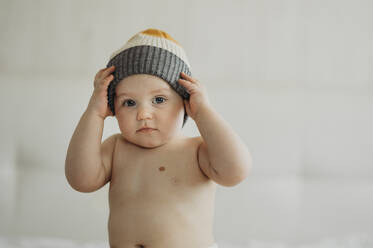 Shirtless boy wearing knit hat - ANAF01110