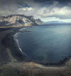 Aerial view of Stokksnes black sand beach with Vesturhorn mountain in background, Austurland, Iceland. - AAEF17718