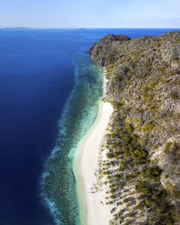 Aerial view of Black Island beachfront on Coron Island, Bayan ng Coron, Palawan, Philippines. - AAEF17787