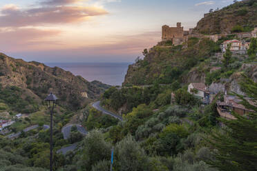 View of Chiesa di San Nicolo Church overlooking town of Savoca at sunset, Savoca, Messina, Sicily, Italy, Mediterranean, Europe - RHPLF23738