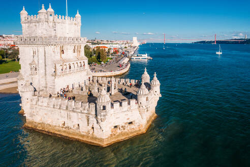 Aerial drone view of Belem Tower, UNESCO World Heritage Site, a 16th century fortification on the Tagus River, Belem, Lisbon, Portugal, Europe - RHPLF23832