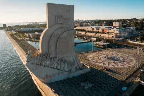 Aerial drone view of Padrao dos Descobrimentos (Monument of the Discoveries), a monument on the northern bank of the Tagus River estuary, Belem, Lisbon, Portugal, Europe - RHPLF23833