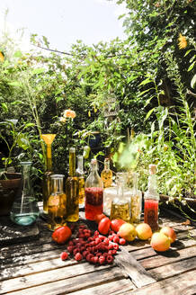 Preparation of herbal infusions in summer garden - HHF05857