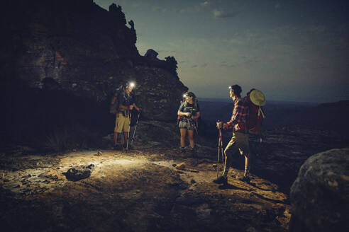 Friends wearing headlamps doing overnight hike on Cederberg Mountains - KOF00065