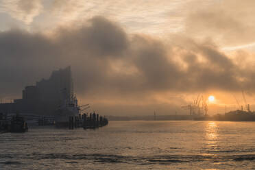 Germany, Hamburg, Clouds over Port of Hamburg and Elbphilharmonie - KEBF02705
