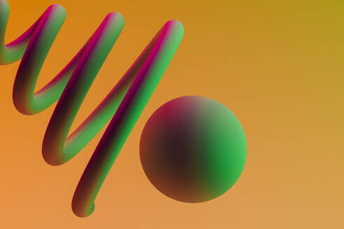 3D render of green sphere and spiral floating against orange background - GCAF00289