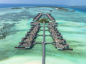 Water bungalows in rows at Kuda Huraa in Maldives - AMF09890