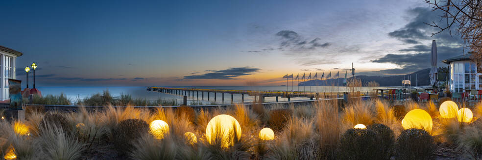 Germany, Mecklenburg-Vorpommern, Binz, Glowing spheres on beach of Rugen island - WGF01461