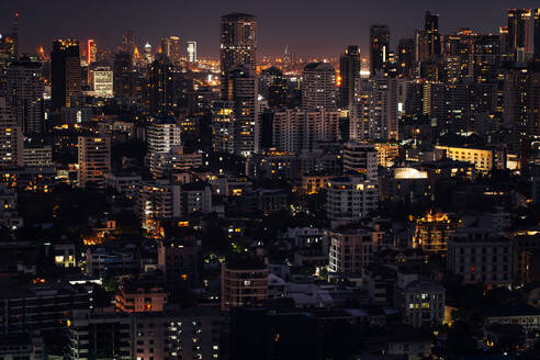 Thailand, Bangkok, Downtown skyscrapers and apartments at night - IKF00410