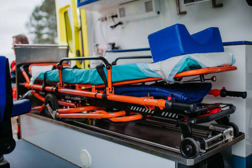 Close-up of empty stretcher inside of the ambulance car. - HPIF09416