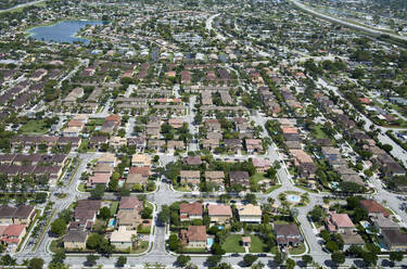 USA, Florida, Miami, Aerial view of suburban neighborhood in summer - BCDF00629