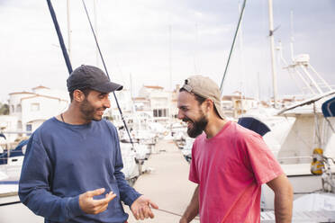 Happy friends having fun at harbor - PCLF00517