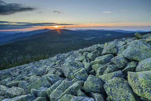 Germany, Bavaria, View from rocky summit of Lusen mountain at sunset - ANSF00365