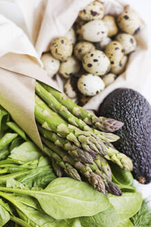 Fresh vegetables with quail eggs in reusable bag - ONAF00532