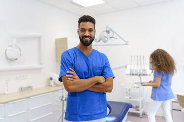 Portrait of young multiracial dentist at a private dental clinic. - HPIF10600