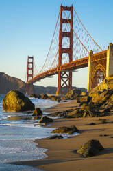 Golden Gate Bridge seen from Marshall Beach at sunset, San Francisco, California, United States of America, North America - RHPLF24020