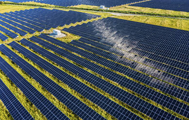 Aerial view of Solar panels in a solar field in Micco, Sebastian, Florida, United States. - AAEF18009