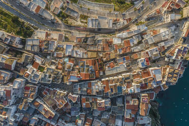 Aerial view of Peschici, a small town near Foggia, Gargano Natural Park, Puglia, Italy. - AAEF18085