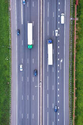 Abstract aerial view of motorway A28 with cars and trucks, Amersfoort, province of Utrecht, The Netherlands. - AAEF18128