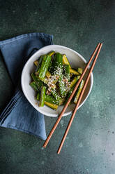 Asian spicy cucumber salad with soy sauce and sesame seeds - ADSF44066