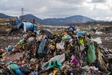 Heaps of waste on landfill, environmental concept. Copy space. - HPIF14385