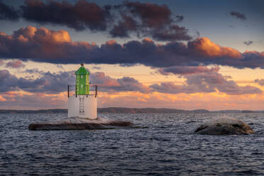 Lighthouse on sea during sunset - FOLF12320