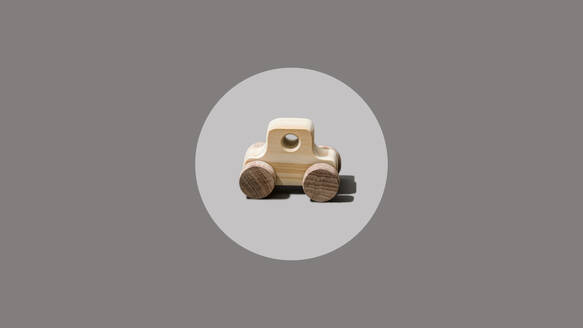 Wooden car in gray circle - FLMF00973