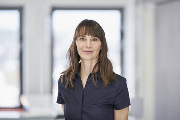 Portrait of confident businesswoman in office - RORF03577