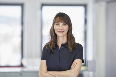 Portrait of confident businesswoman in office - RORF03579