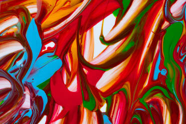 From above concept of multicolored brush strokes of acrylic colors on white canvas - ADSF44308
