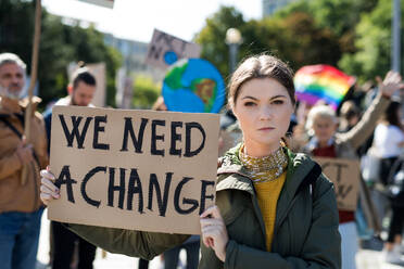 People with placards and posters on a global strike for climate change. - HPIF19203