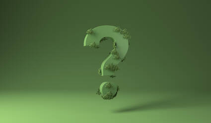 Question sign covered with green plants against green background - MSMF00054