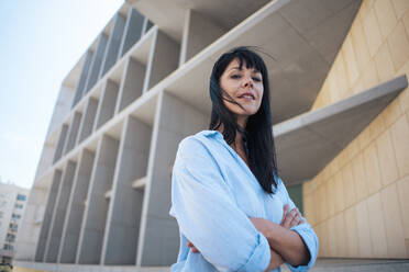 Confident mature businesswoman with arms crossed - JOSEF19696