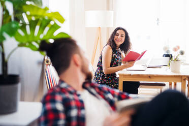 Young friends relaxing indoors, a house sharing concept. - HPIF21910